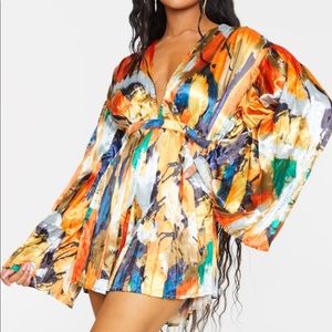 Pretty little thing new romper size 4